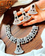 Zircon necklace set with teeka
