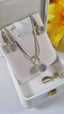 Zircon pendant set