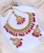 Kundan necklace set with teeka