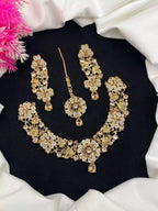 Zircon necklace set with teeka