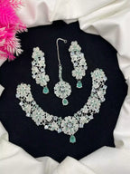Zircon necklace set with teeka