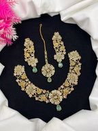 Zircon necklace set with teeka