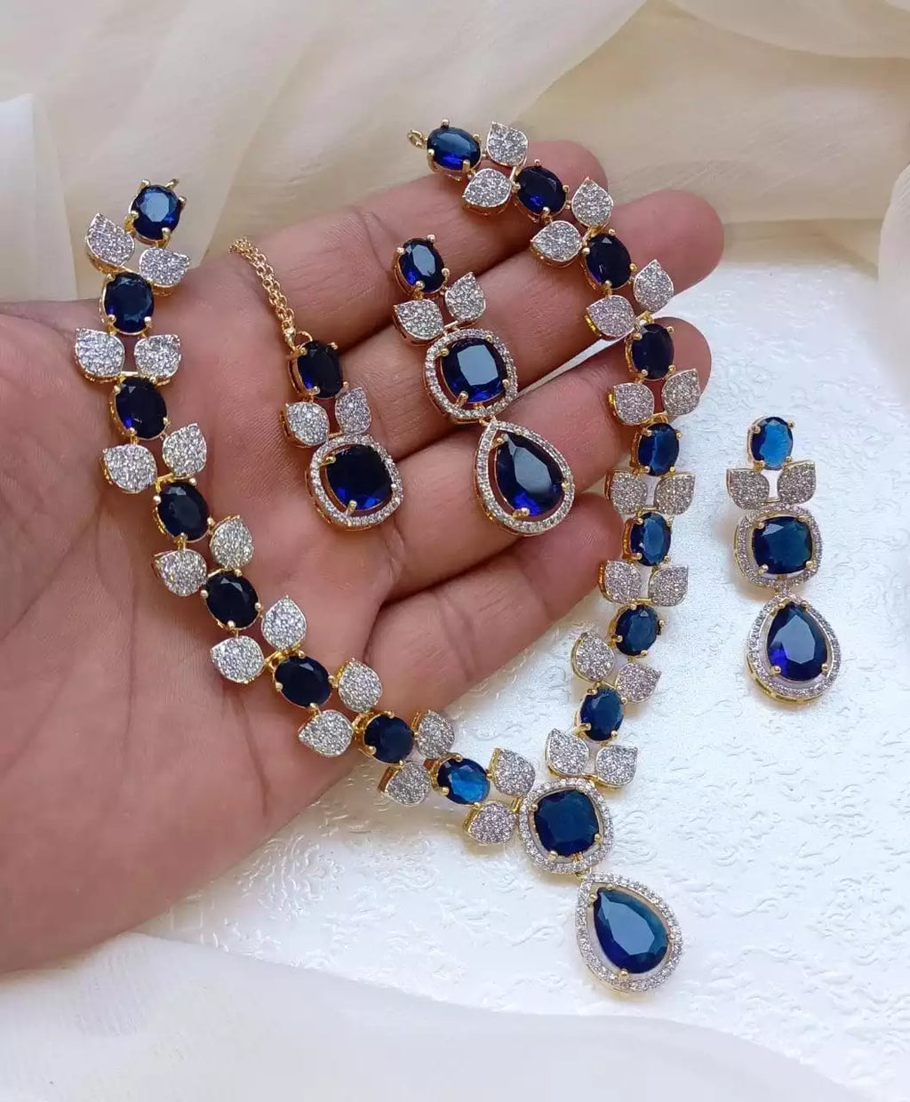 AD necklace set with teeka