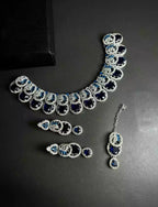 Zircon necklace set with teeka