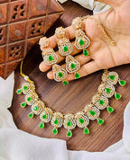 Zircon necklace set with teeka