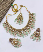 Kundan necklace set with teeka