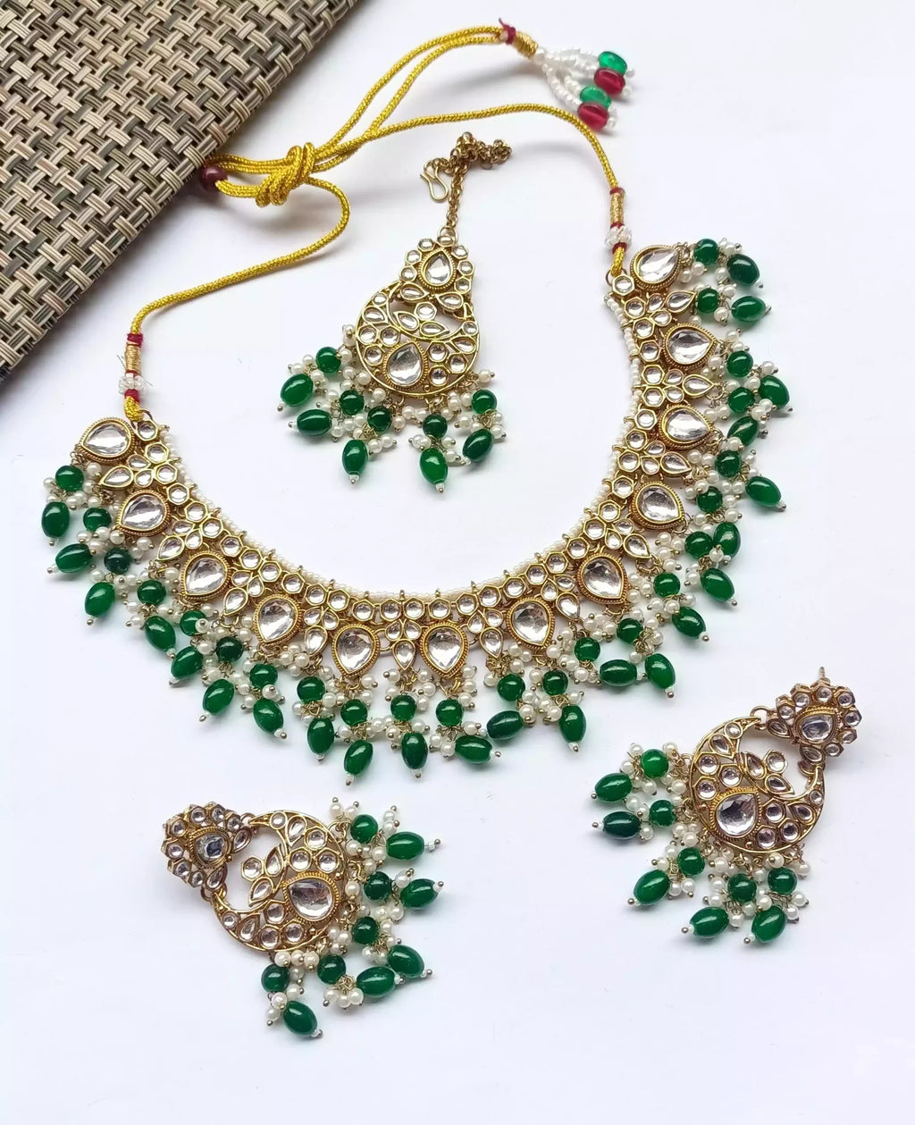Kundan necklace set with teeka