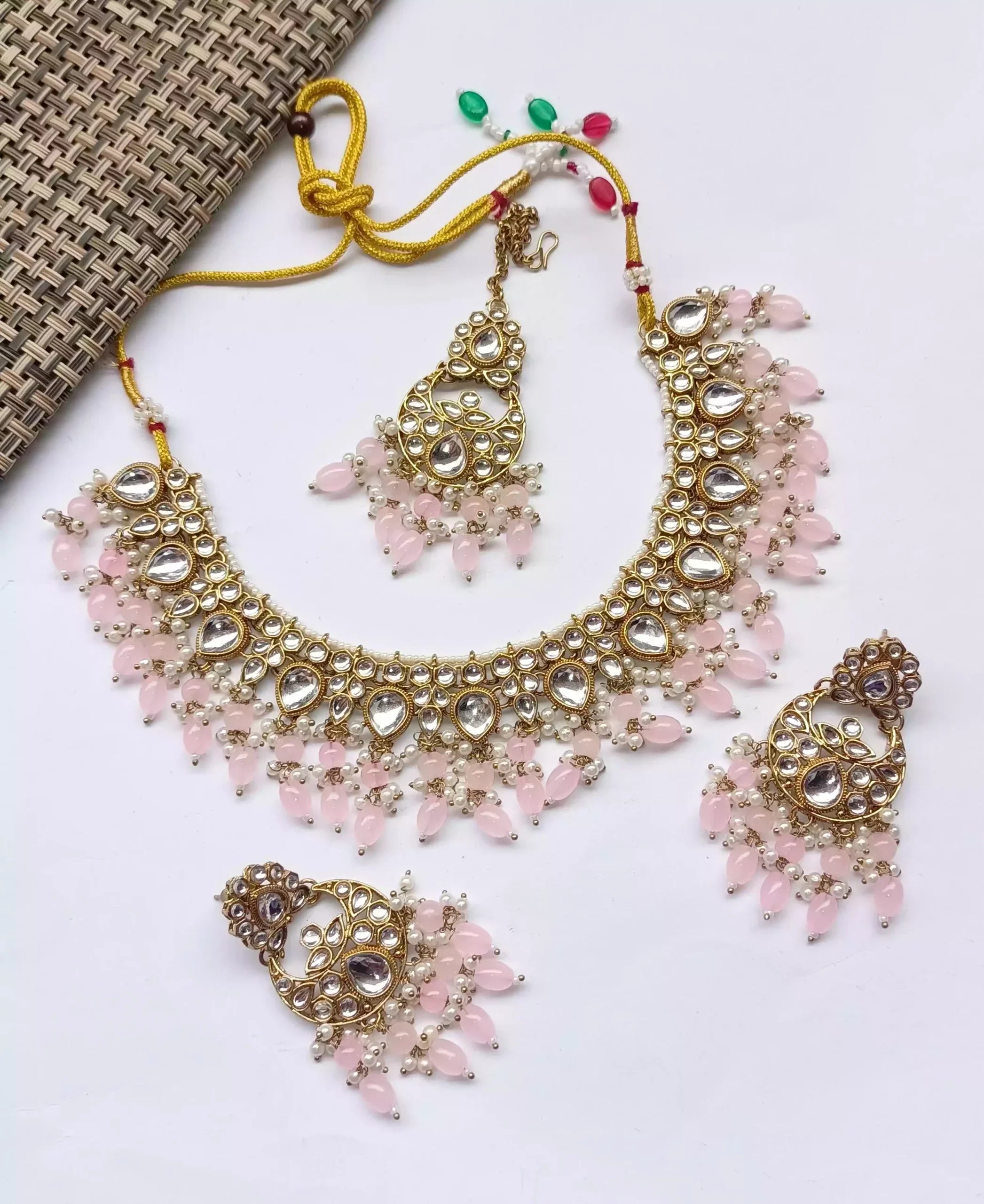 Kundan necklace set with teeka