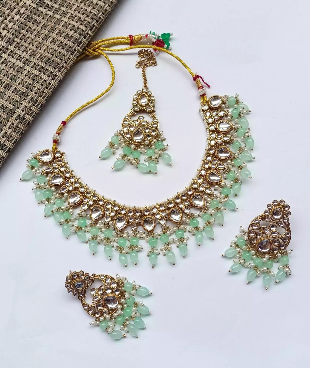 Kundan necklace set with teeka