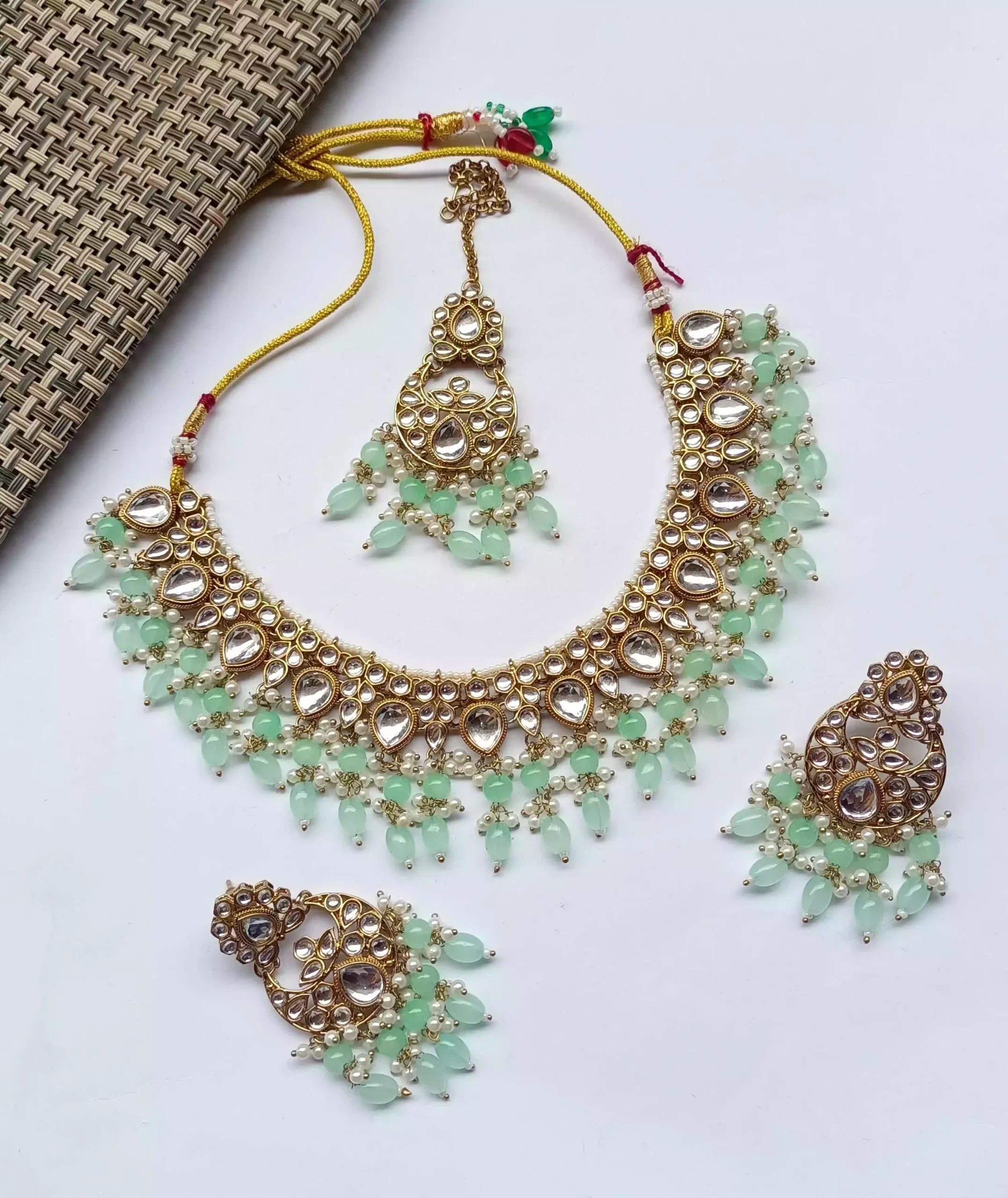 Kundan necklace set with teeka
