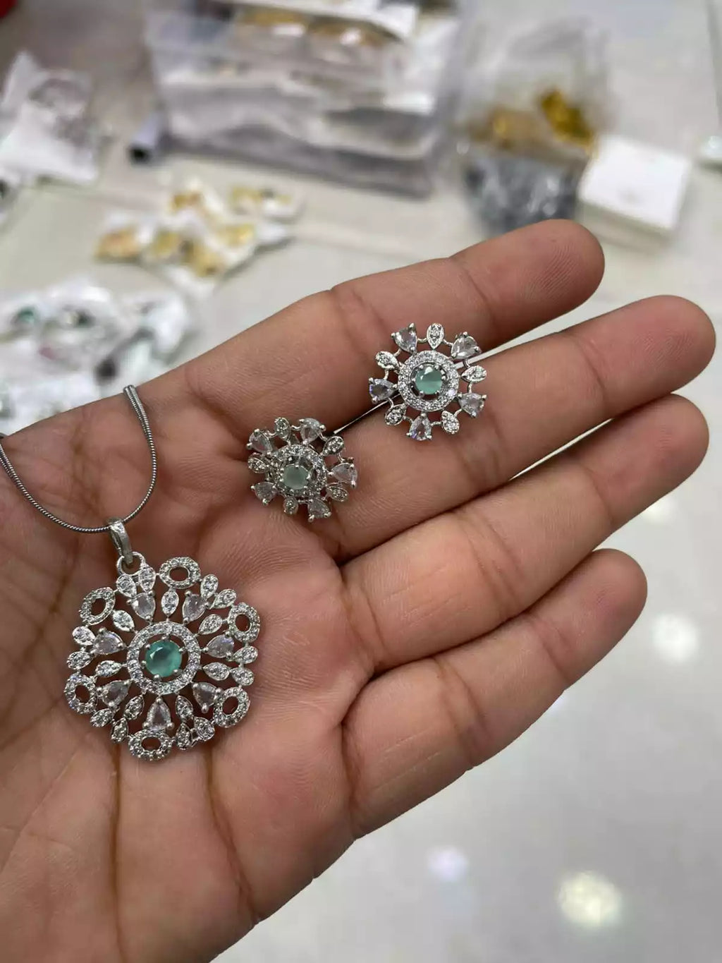 Delicate zircon pendant set