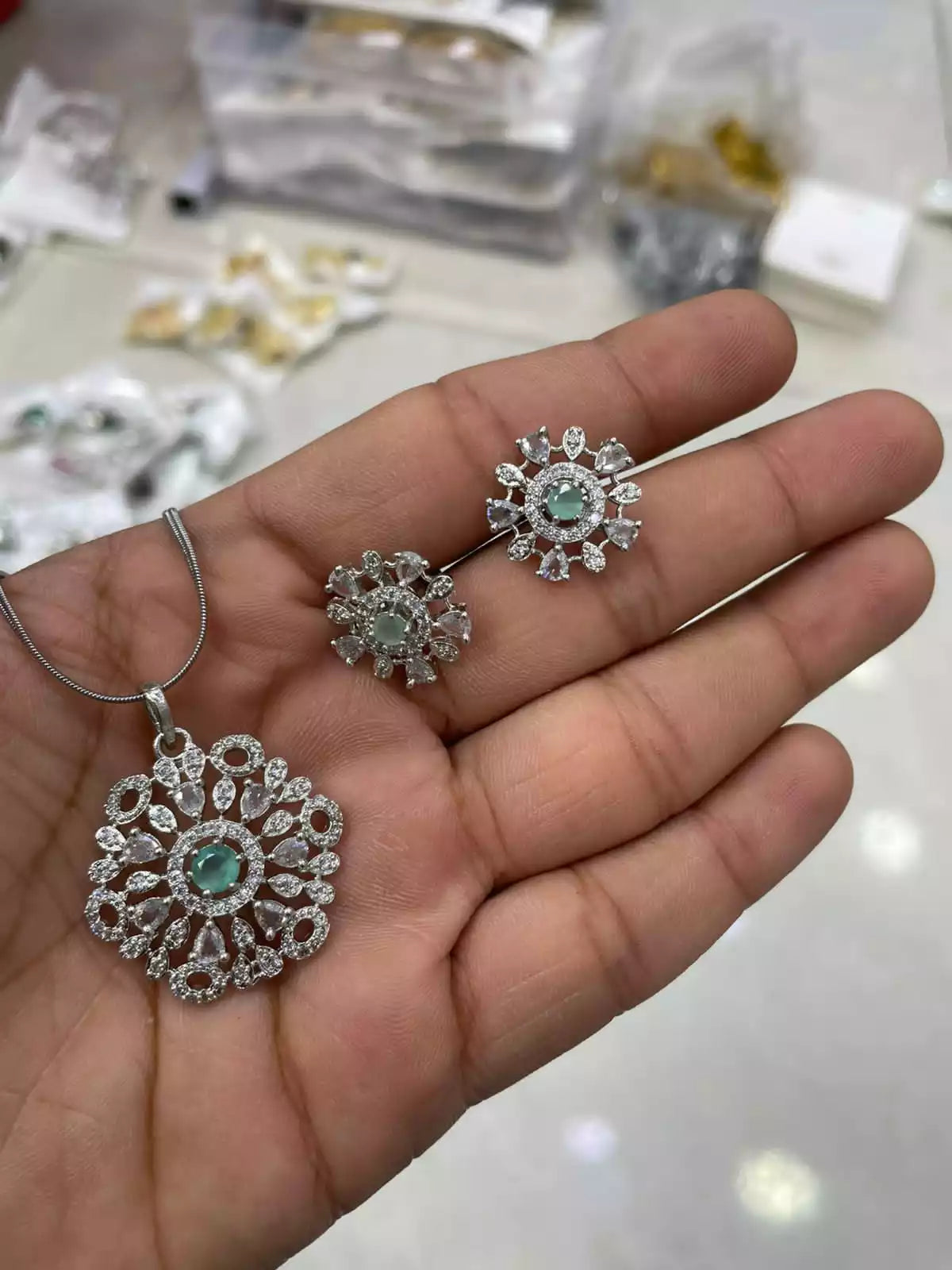 Delicate zircon pendant set
