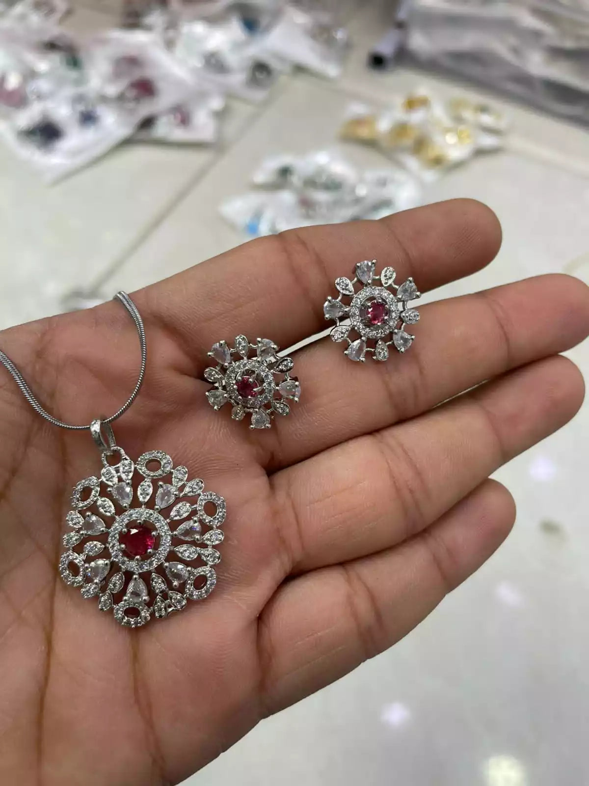 Delicate zircon pendant set