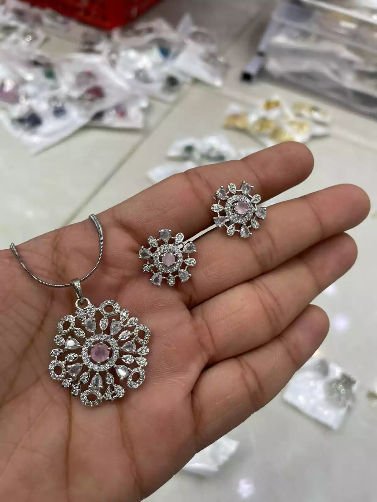 Delicate zircon pendant set