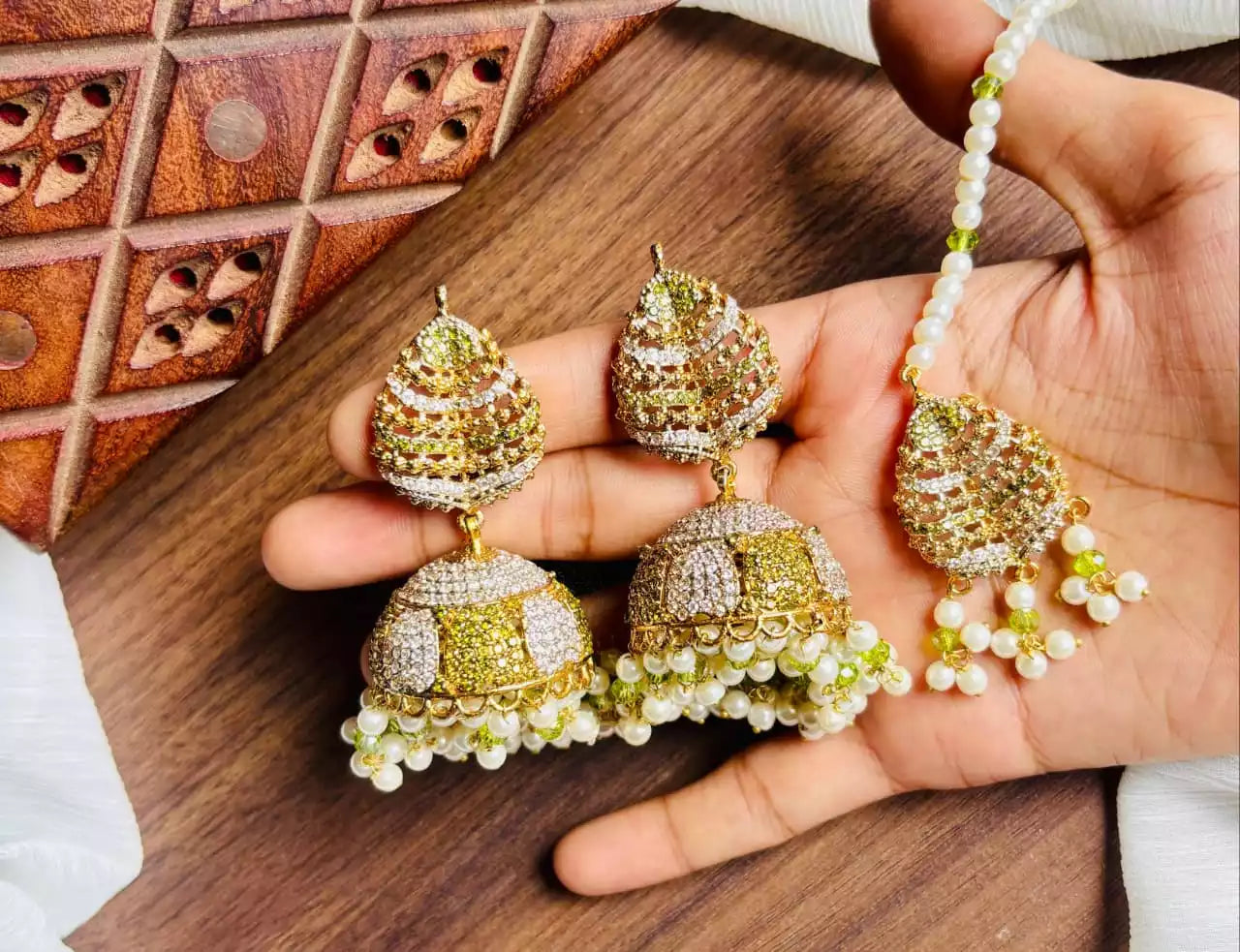 Designer earrings with teeka