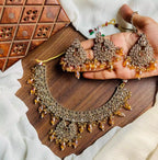 Zircon necklace set with teeka