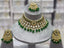 Kundan necklace set with teeka