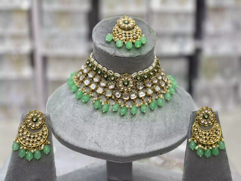 Kundan necklace set with teeka