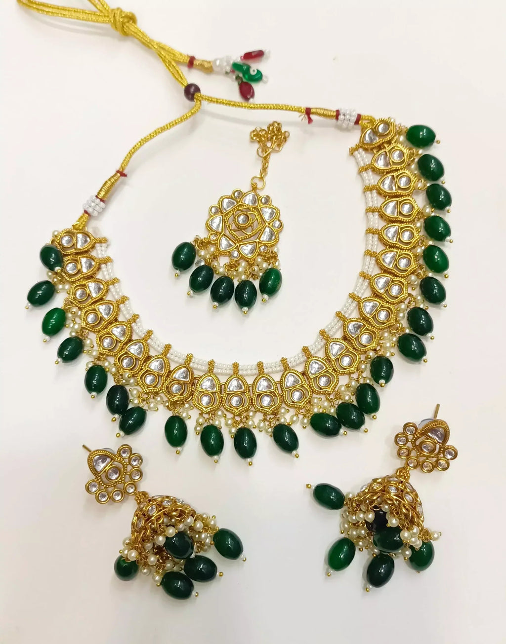 Kundan necklace set with teeka