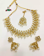 Kundan necklace set with teeka