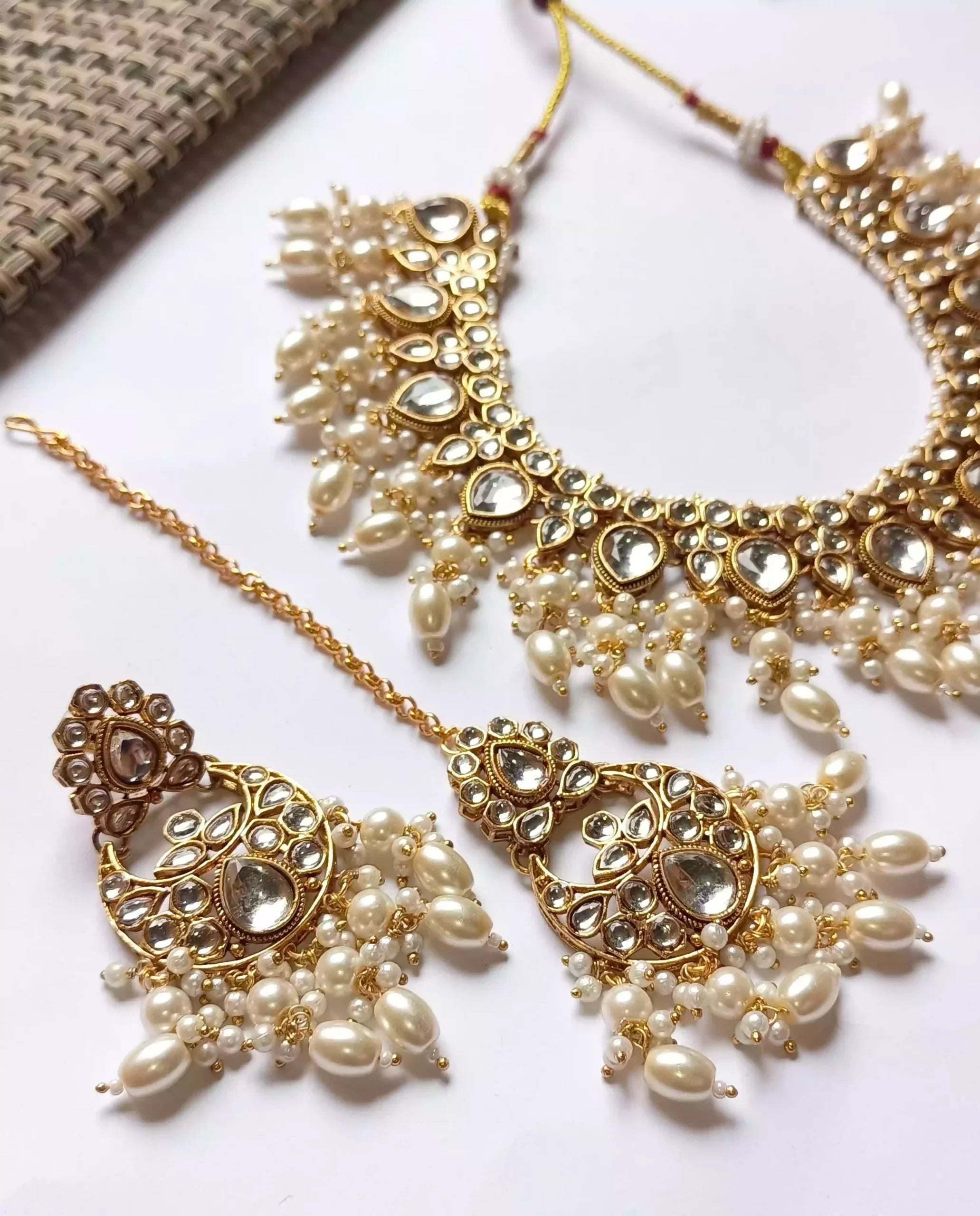 Kundan necklace set with teeka