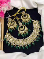 Kundan necklace set with teeka