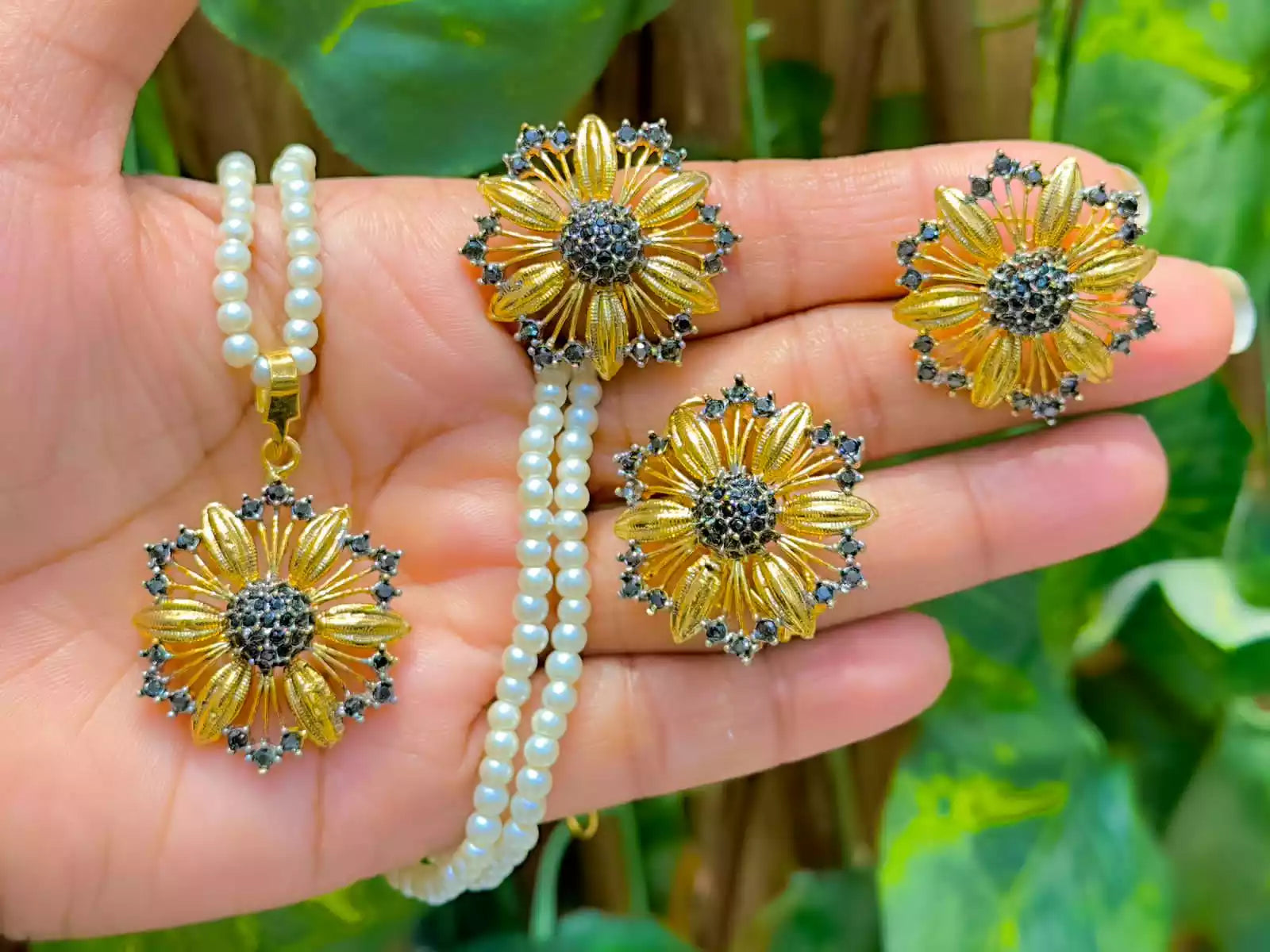 Gold plated floral pendant set