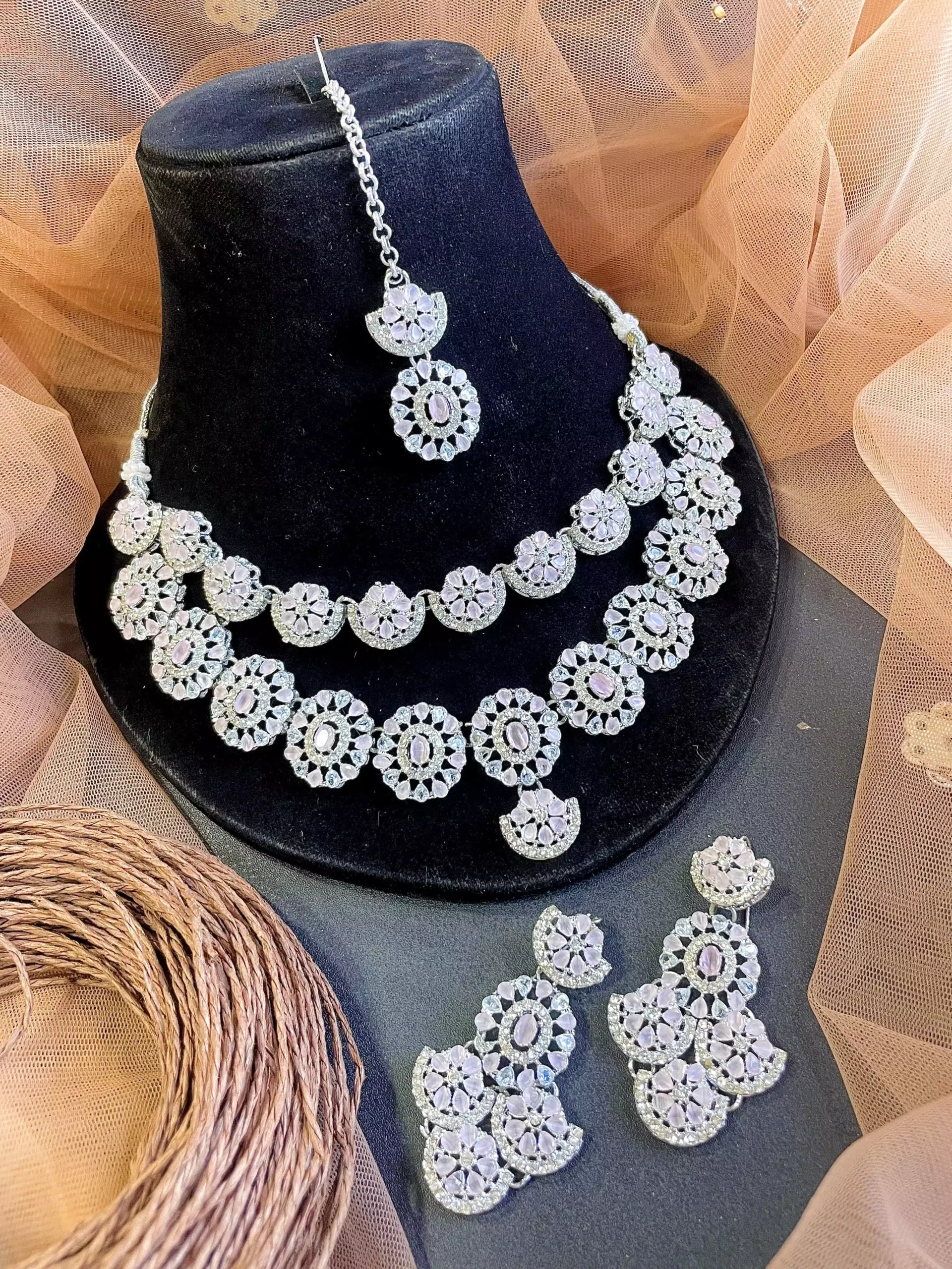 Double layer zircon set with teeka Main image