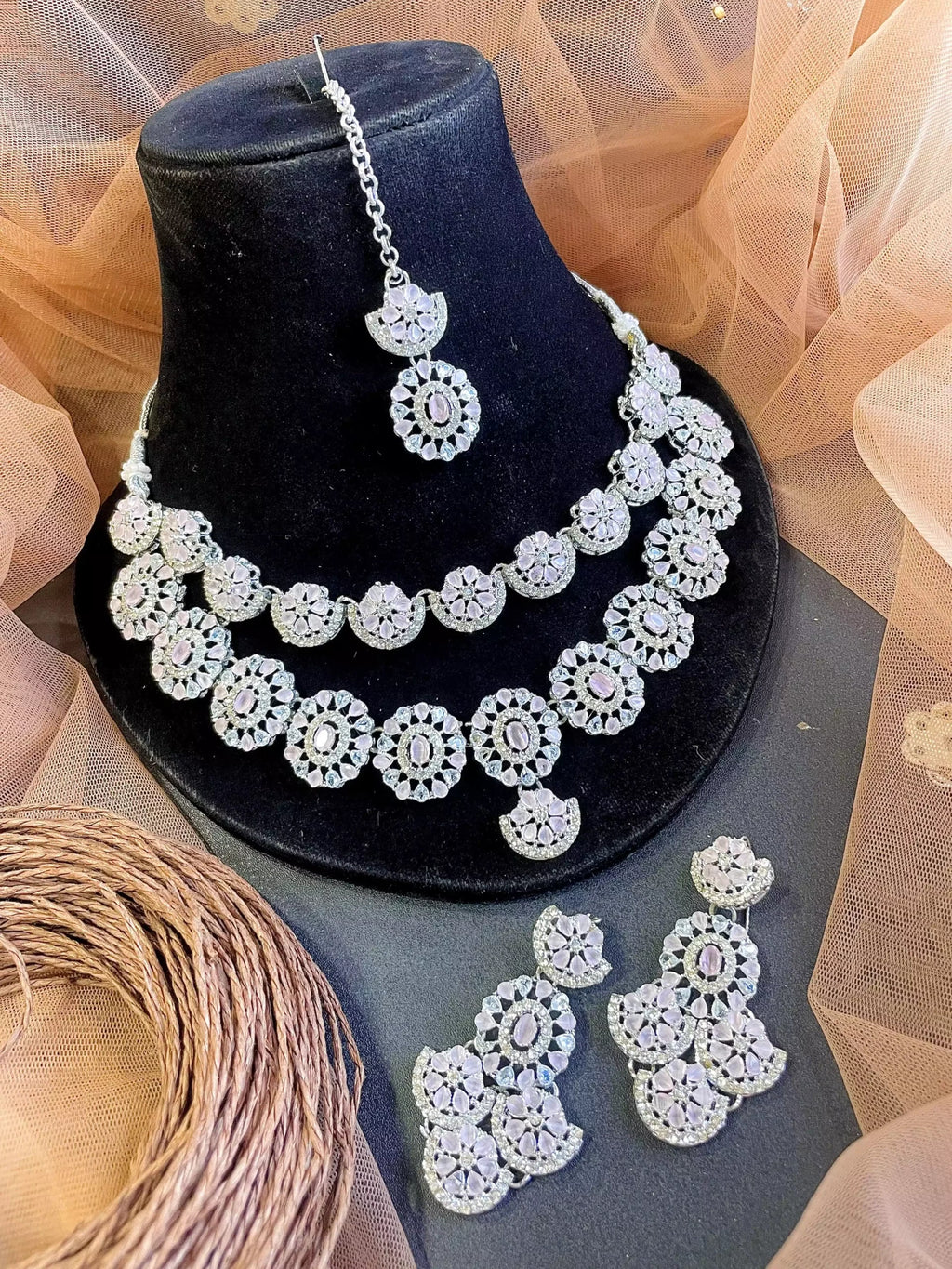 Double layer zircon set with teeka