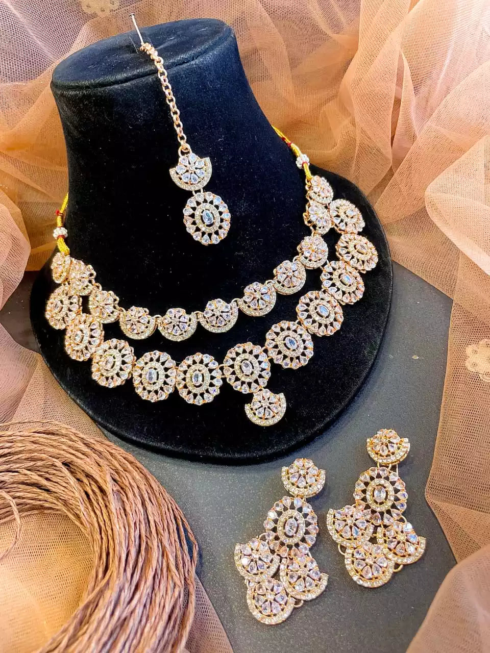 Double layer zircon set with teeka