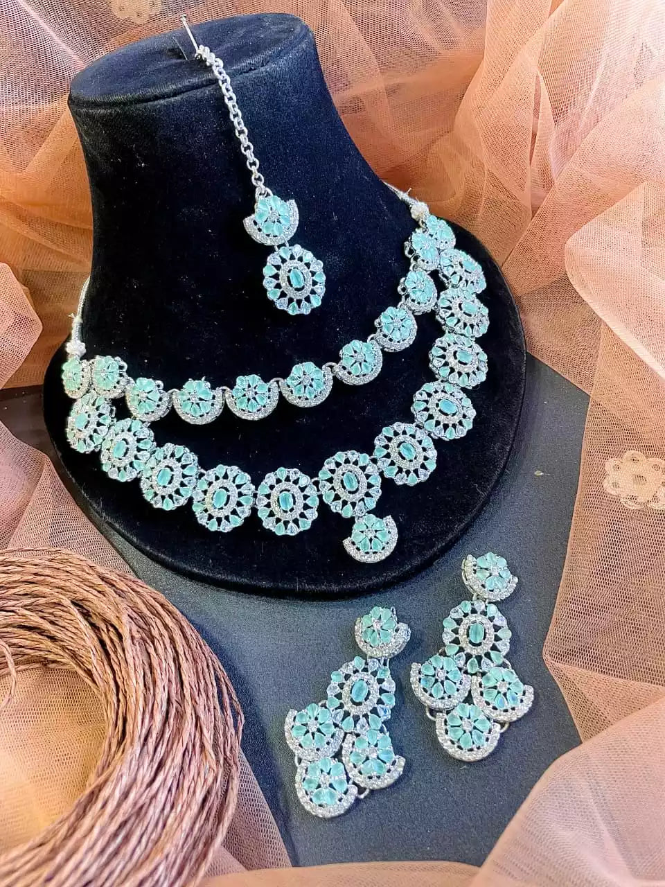 Double layer zircon set with teeka