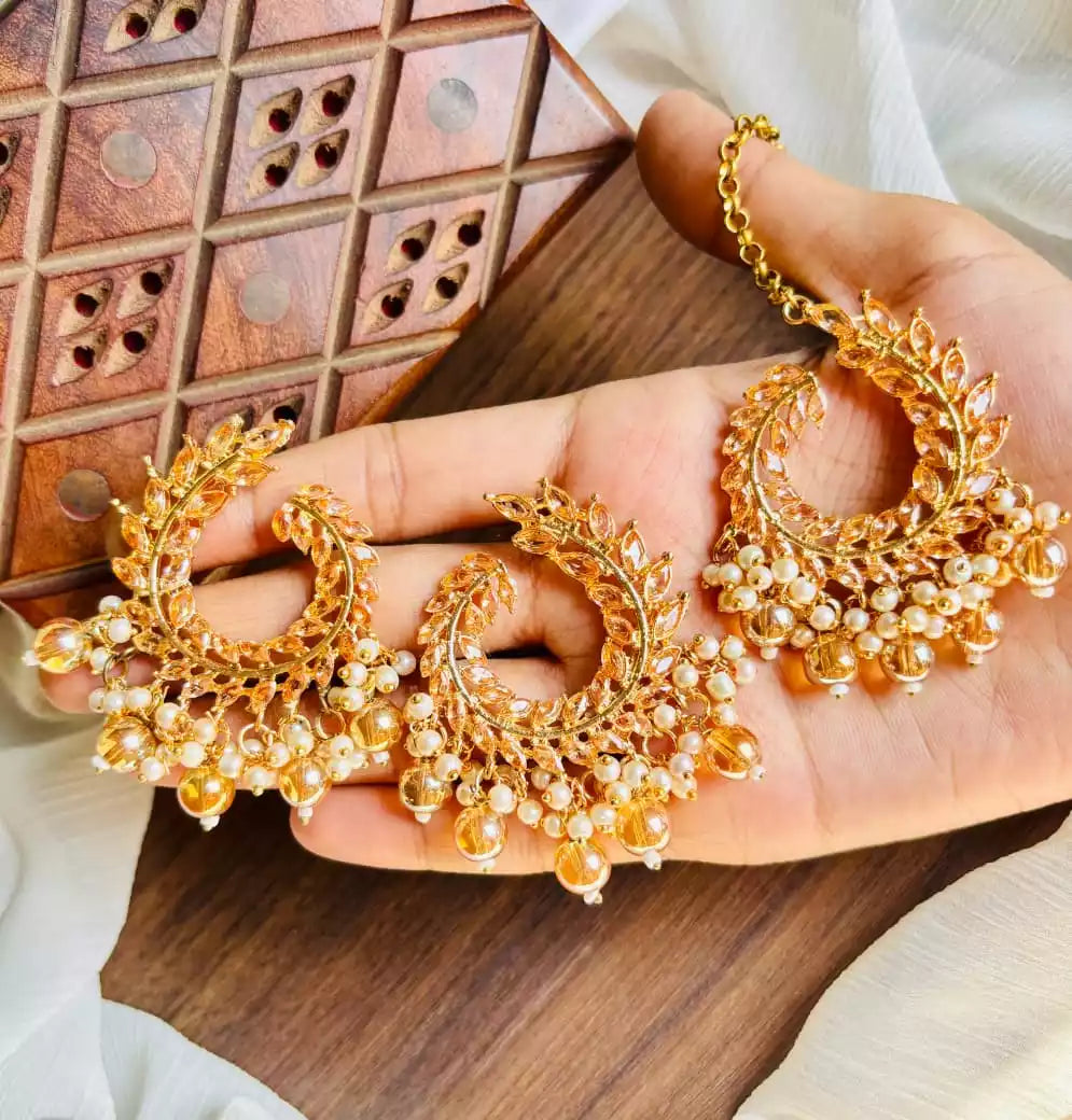 Zircon earrings with teeka