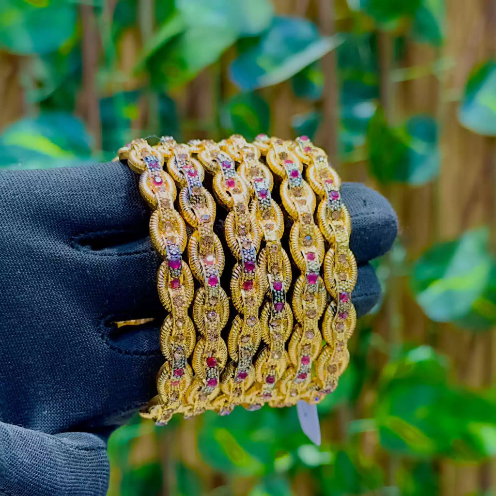 Gold plated designer bangles set