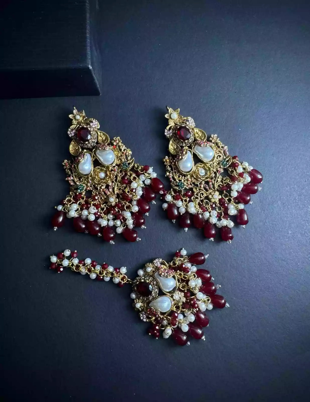 Stylish earrings with teeka