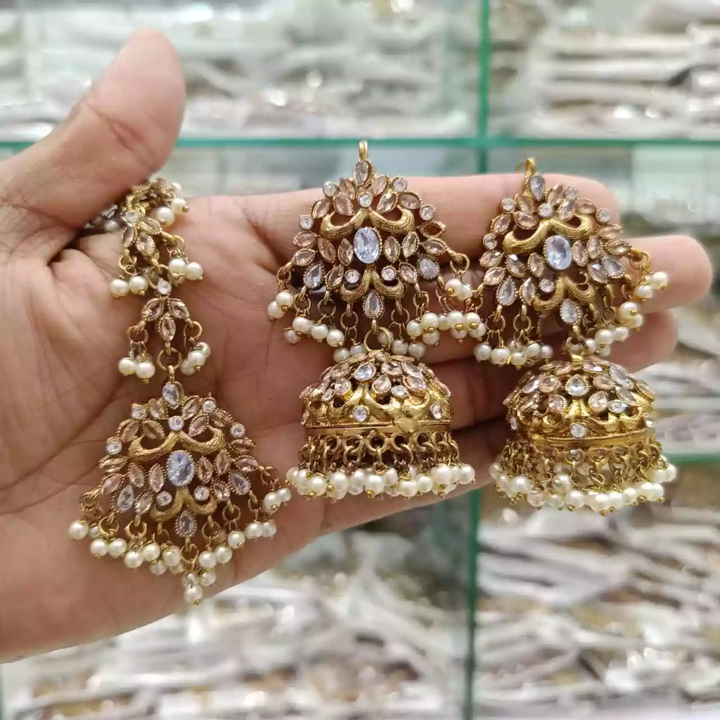 Zircon earrings with teeka