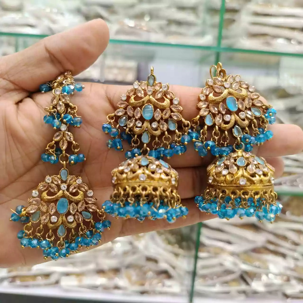 Zircon earrings with teeka