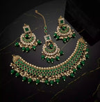 Kundan necklace set with teeka