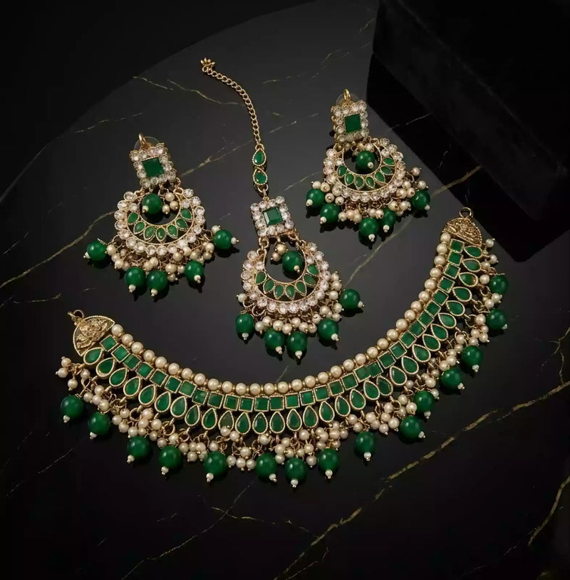 Kundan necklace set with teeka