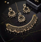 Kundan necklace set with teeka