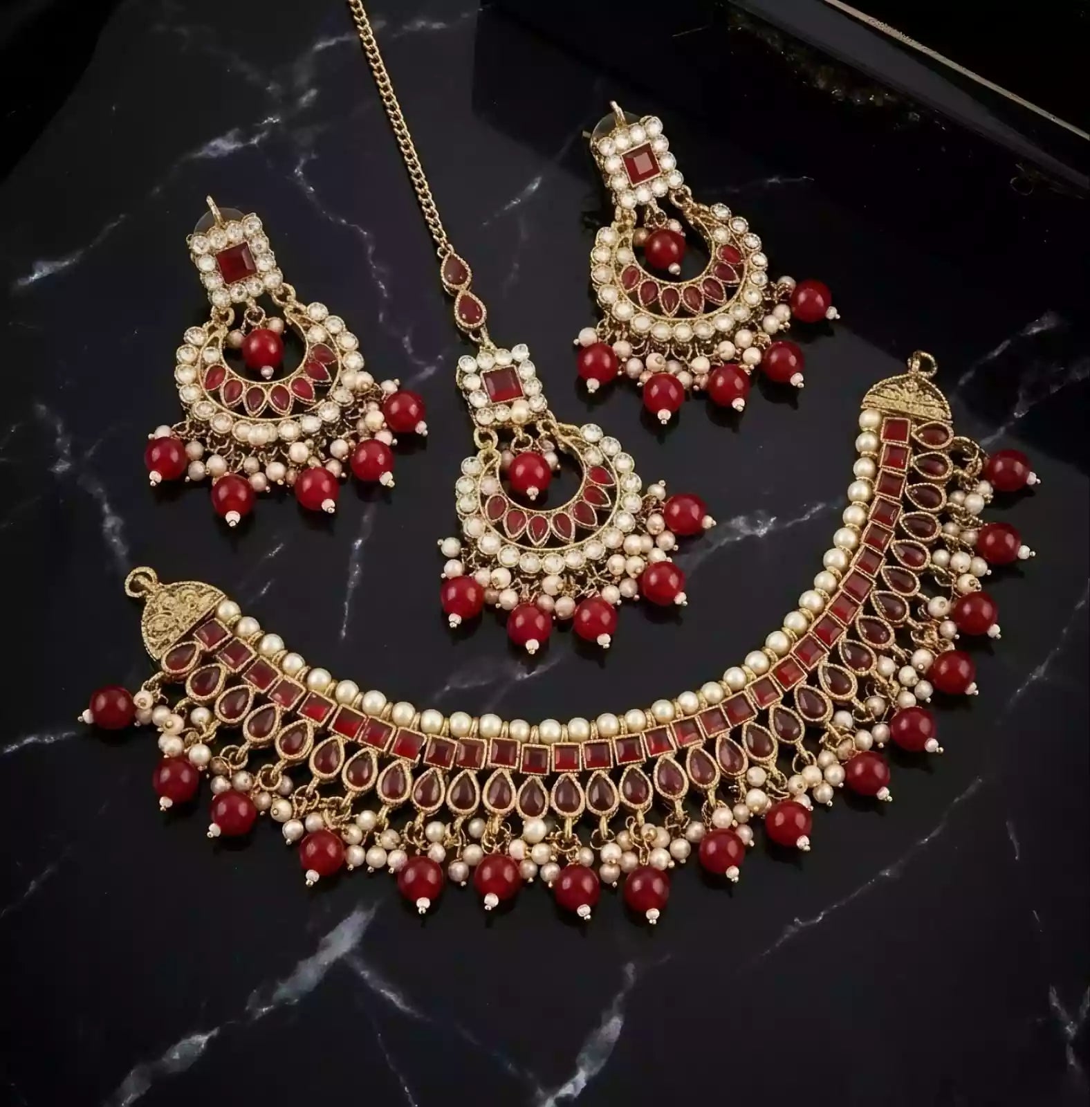 Kundan necklace set with teeka