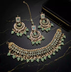 Kundan necklace set with teeka