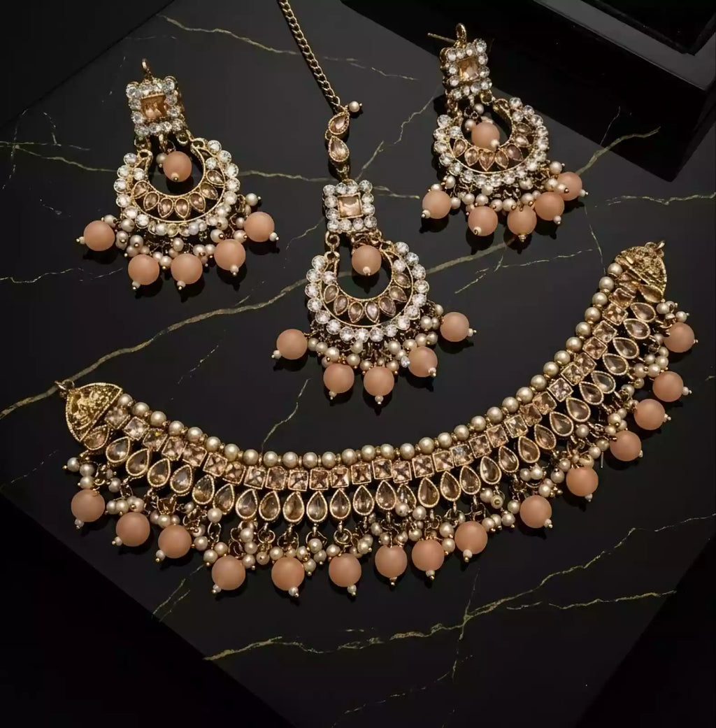 Kundan necklace set with teeka