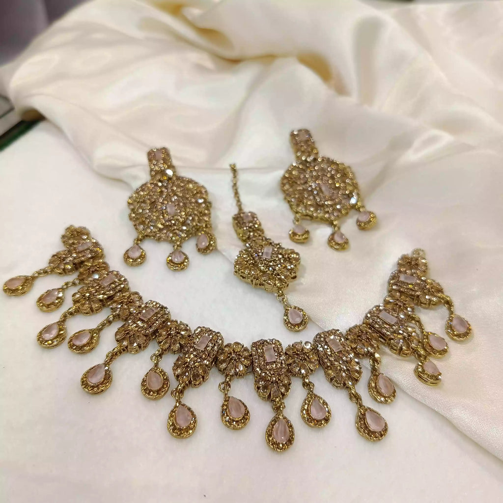 Zircon necklace set with teeka
