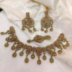 Zircon necklace set with teeka