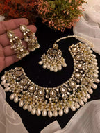 Kundan necklace set with teeka
