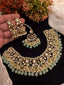Kundan necklace set with teeka