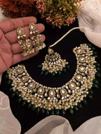 Kundan necklace set with teeka