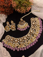 Kundan necklace set with teeka