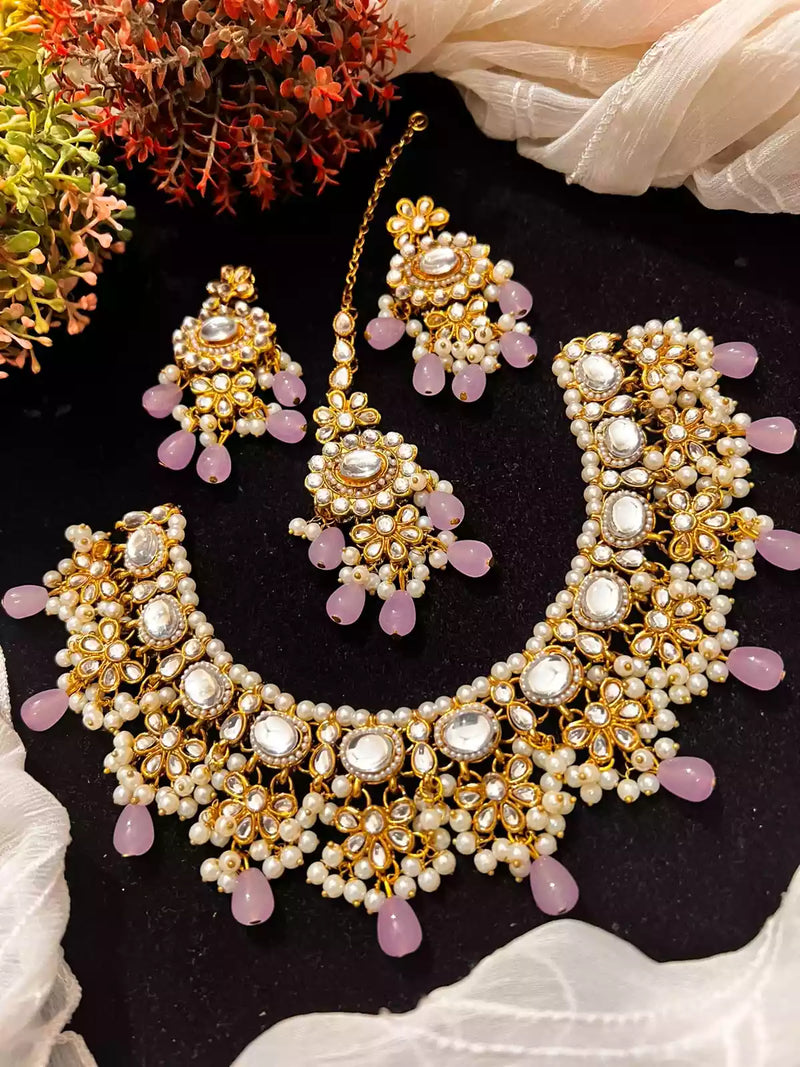 Kundan necklace set with teeka