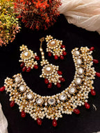 Kundan necklace set with teeka